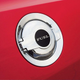 Image for article titled Gas Cap Challenge: Ford Mustang Vs. AMC Gremlin